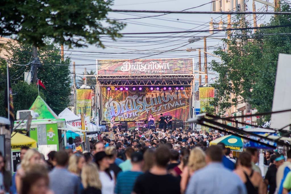street festival goers enjoy the performers at the deutschtown music festival in pittsburgh