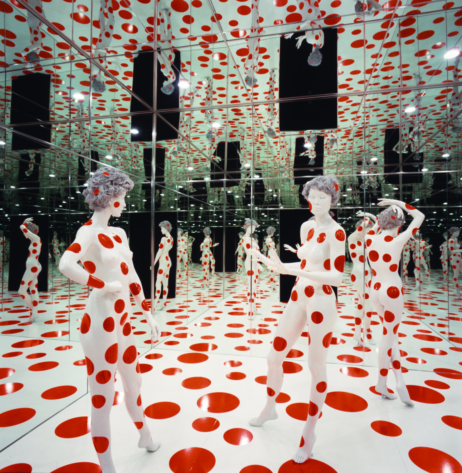 mannequins covered in red dots at the mattress factory museum in pittsburgh pennsylvania