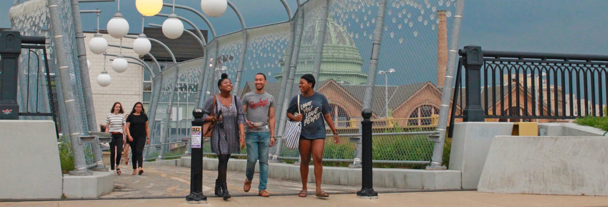 Group of friends walking around the city of Pittsburgh, PA