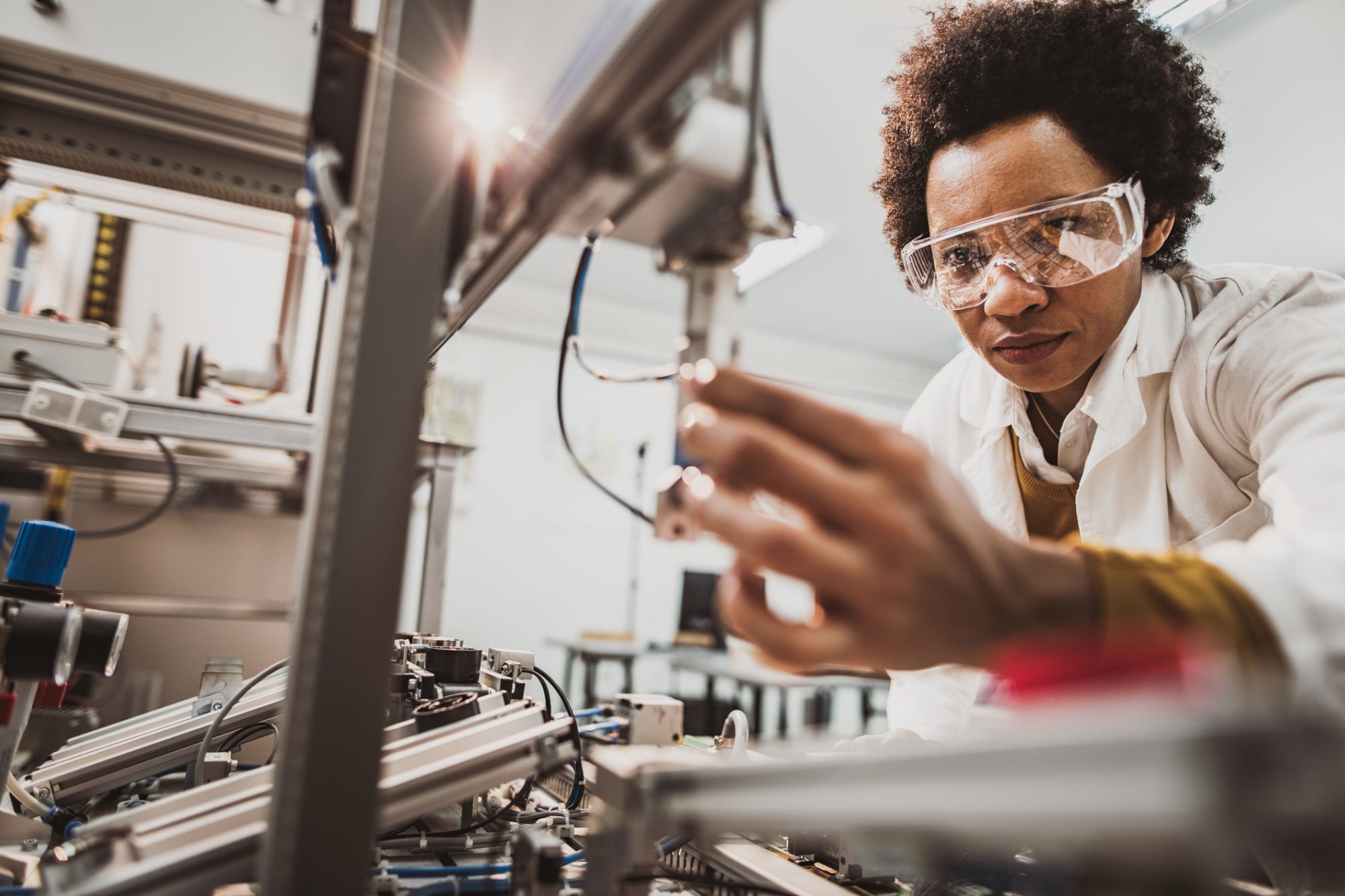 An employee working at a manufacturing company