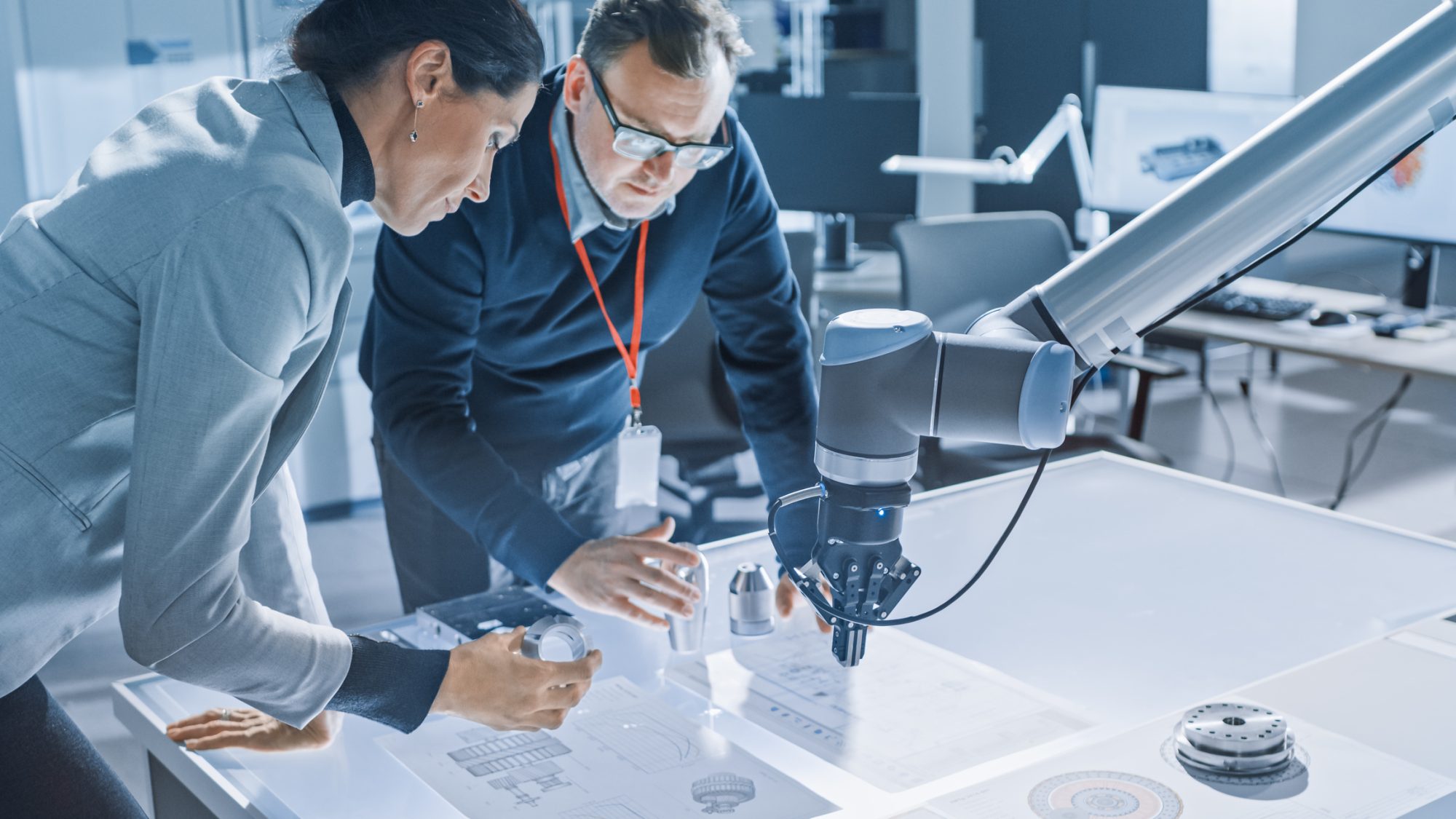 Two employees in a robotics lab in Pittsburgh, the birthplace of robotics