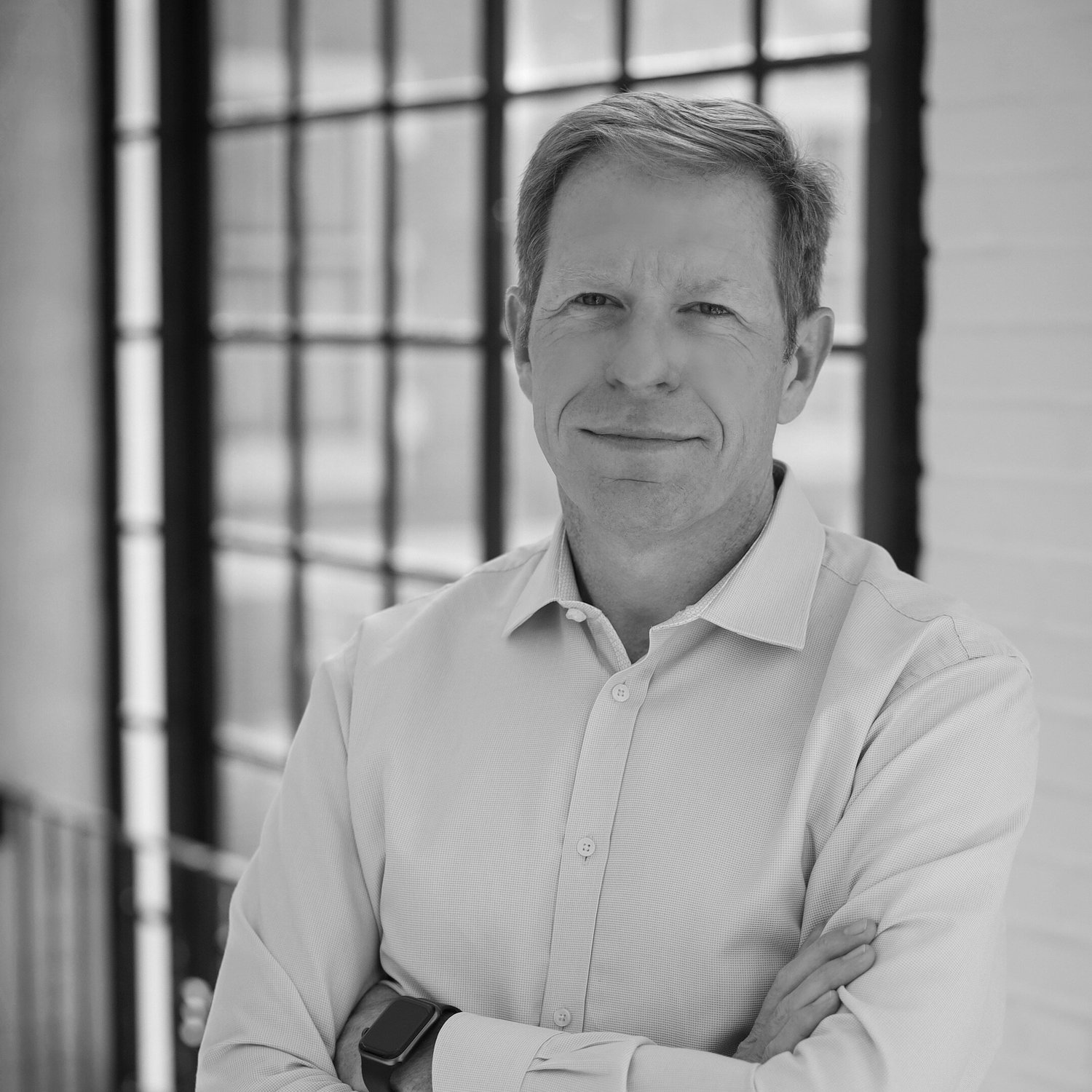 John Barnes' headshot, founder of The Barnes Global Advisors