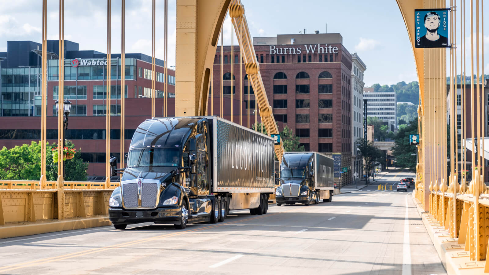 Truck driving through Pittsburgh.