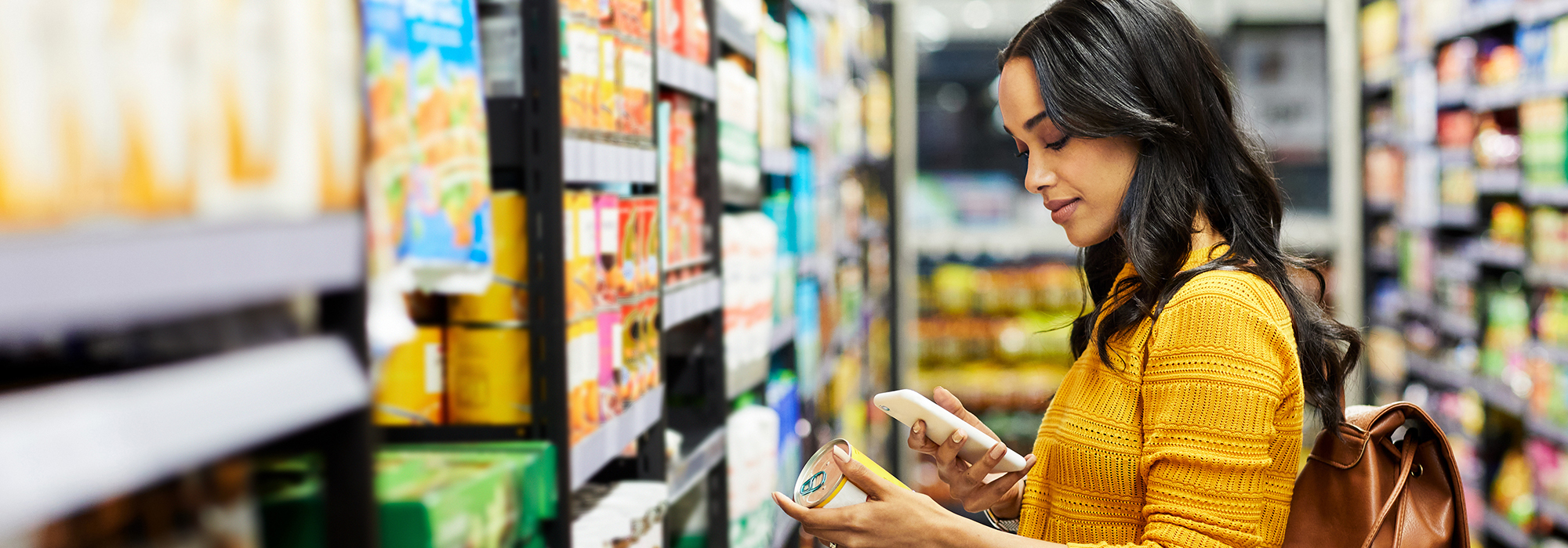 A young woman shopping for groceries