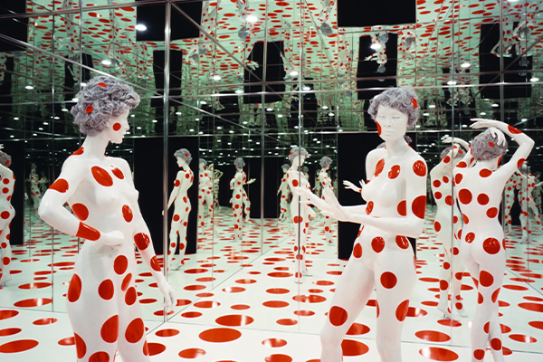 Mannequins covered in red dots at the Mattress Factory in Pittsburgh, Pennsylvania