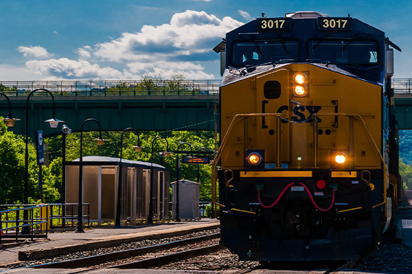 A CSX train pulling into a Pittsburgh rail station