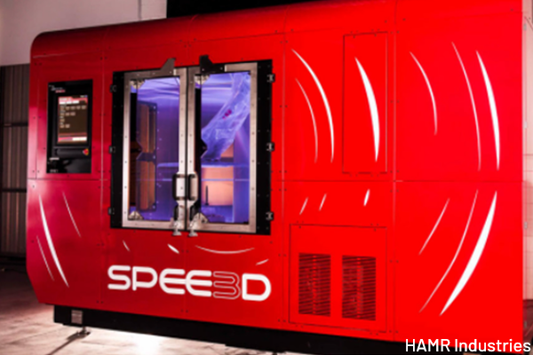 HAMR Industries’s large, red WarpSPEE3D system.