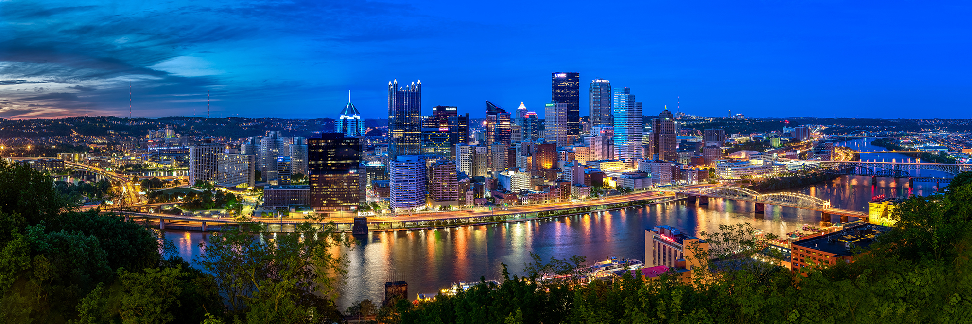 A panoramic view of Pittsburgh at night