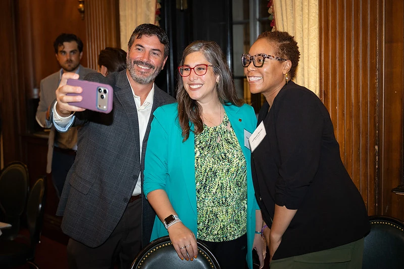 Group of people taking a selfie